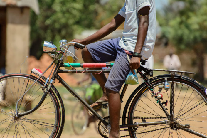 An African cyclist heads home.