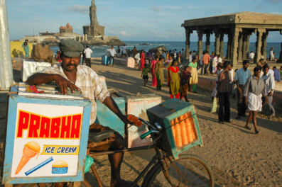 A cycling ice cream salesman in South India.