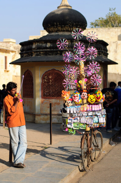 A bicycle is loaded up with toys for sale in India
