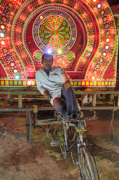 A neon wedding rickshaw in India