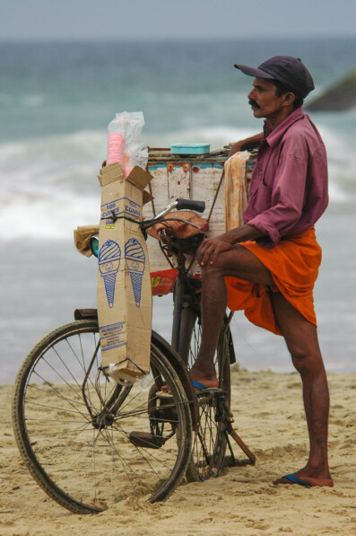 A cycling ice cream salesman in South India
