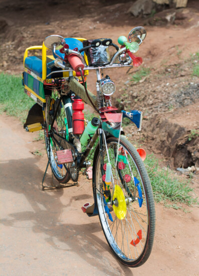 An exaborately decorated bicycle taxi in Malawi