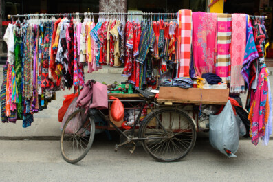 A bicycle supports a clothes rack in China