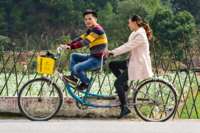 Cycling Chinese tourists in Yangshuo China