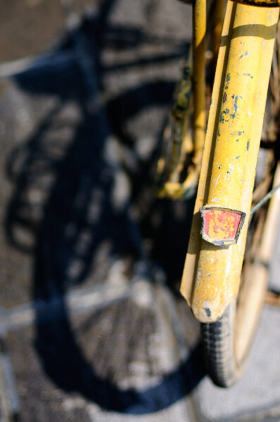 A yellow bicycle fender
