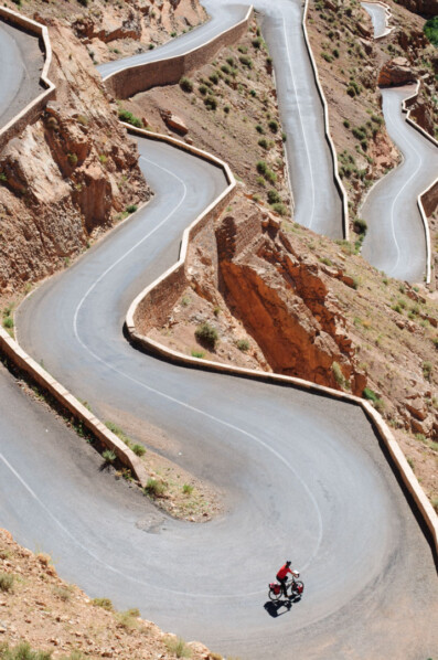 Cycling down switchbacks in Southern Morocco