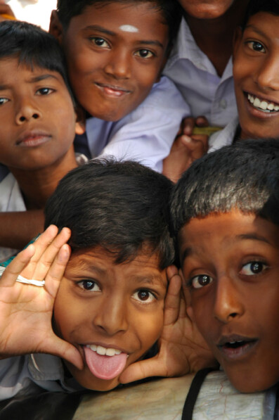 Kids pull faces in India.