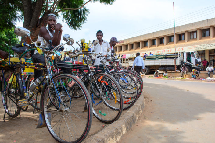 African bicycle chauffeurs wait for customers