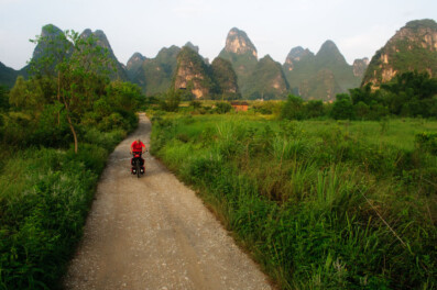 Cycling through the Karst mountains near Yangshuo, China