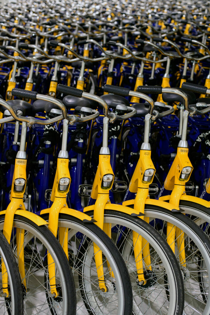 Parked public transport bicycles in the underground bicycle parking garage of the Hague, the Netherlands.