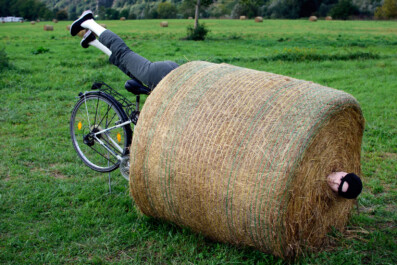 A cyclist mannequin looks as if it hit a hay bale on the Moselle bike route.